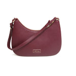Berry colour cross body bag in vegan leather by Alice Wheeler London