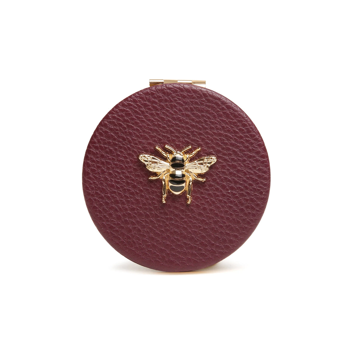 Round berry colour compact mirror with a bee emblem by Alice Wheeler London