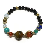 Multicoloured solar system style beaded bracelet with gold accents