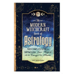Book cover of 'The Modern Witchcraft Book of Astrology' with celestial designs and text.