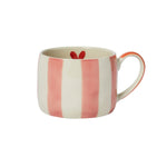 Stoneware mug with pink and white stripes and a red heart inside.