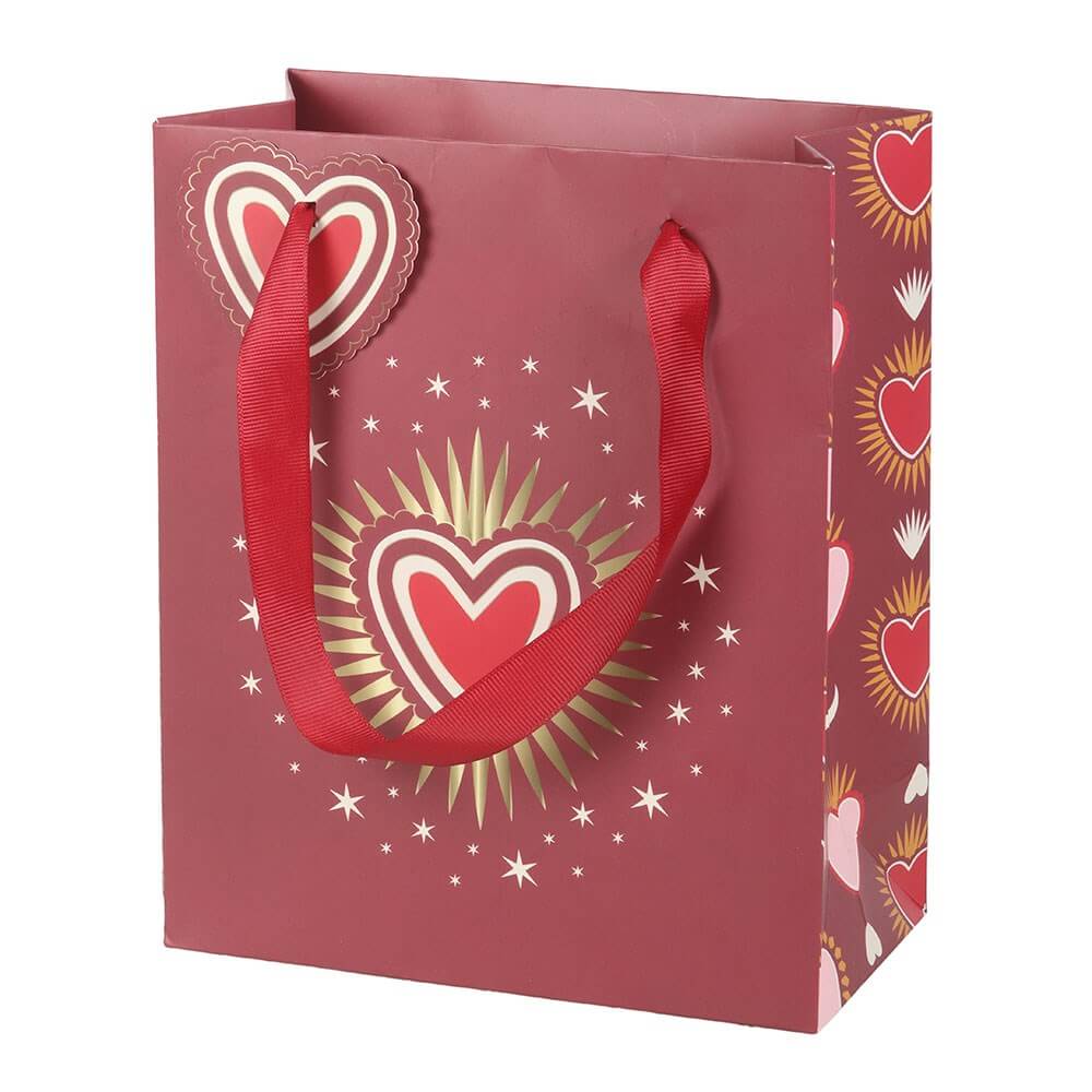 Red gift bag with sacred heart design