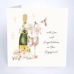 Pretty engagement card with champagne bottle and flowers 