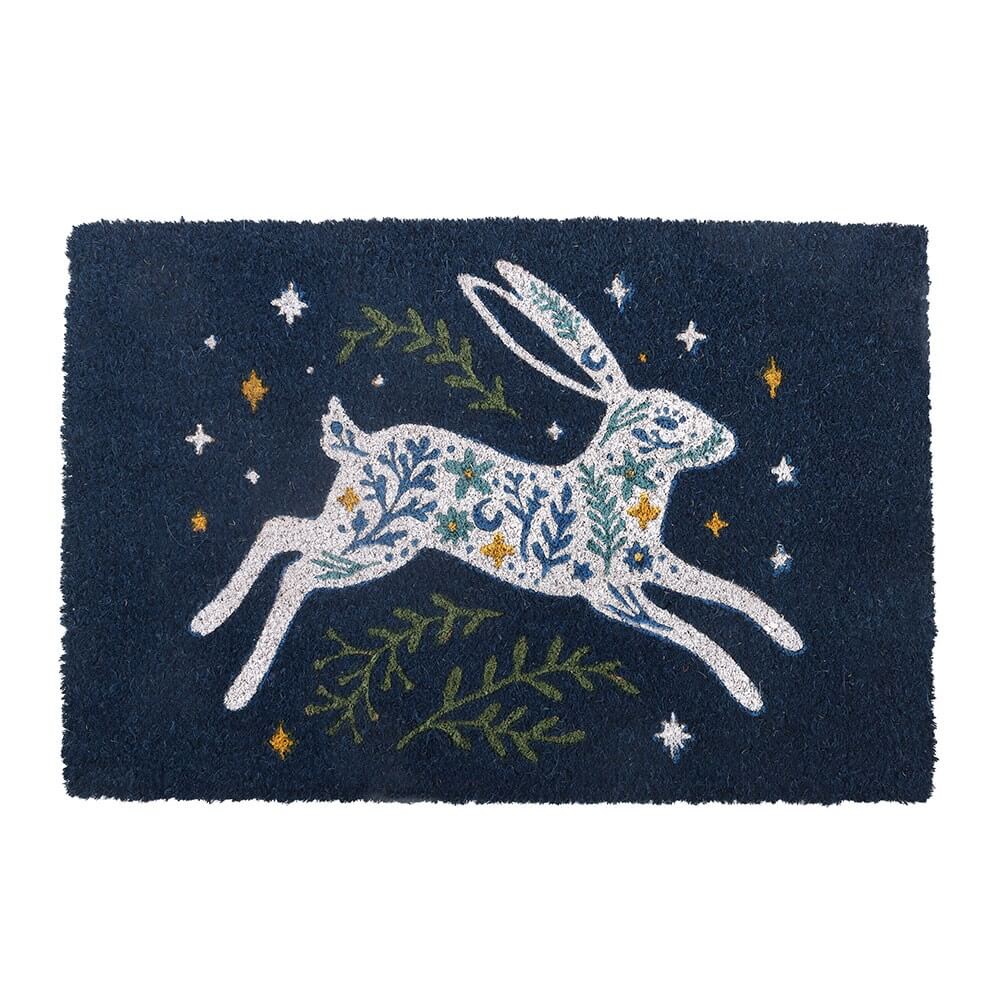 Decorative coir doormat with a white leaping hare design on a dark blue background.