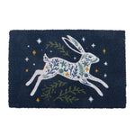 Decorative coir doormat with a white leaping hare design on a dark blue background.
