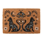 Decorative doormat with frightful black catsand celestial elements on a natural coir background
