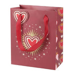 Red gift bag with sacred heart design